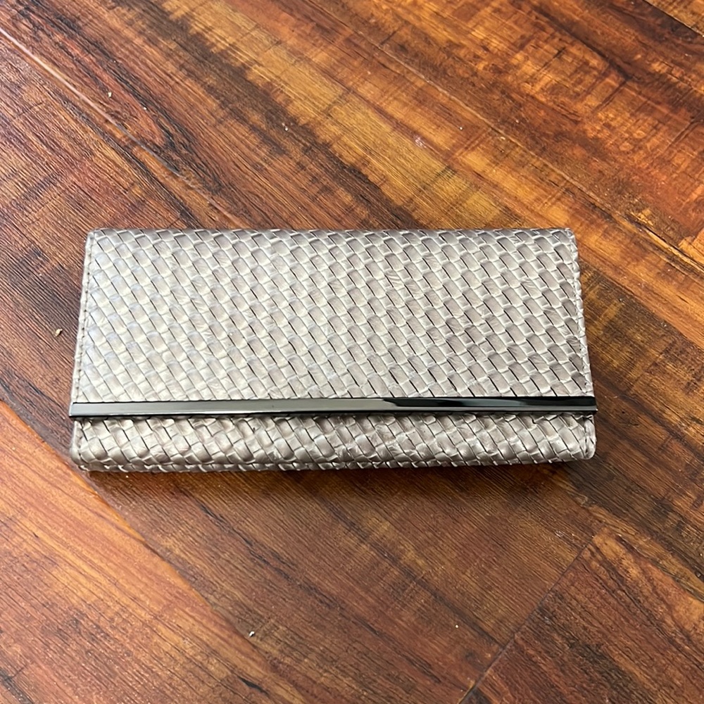 Cute like new unique wallet - kinda like a rose goldish color